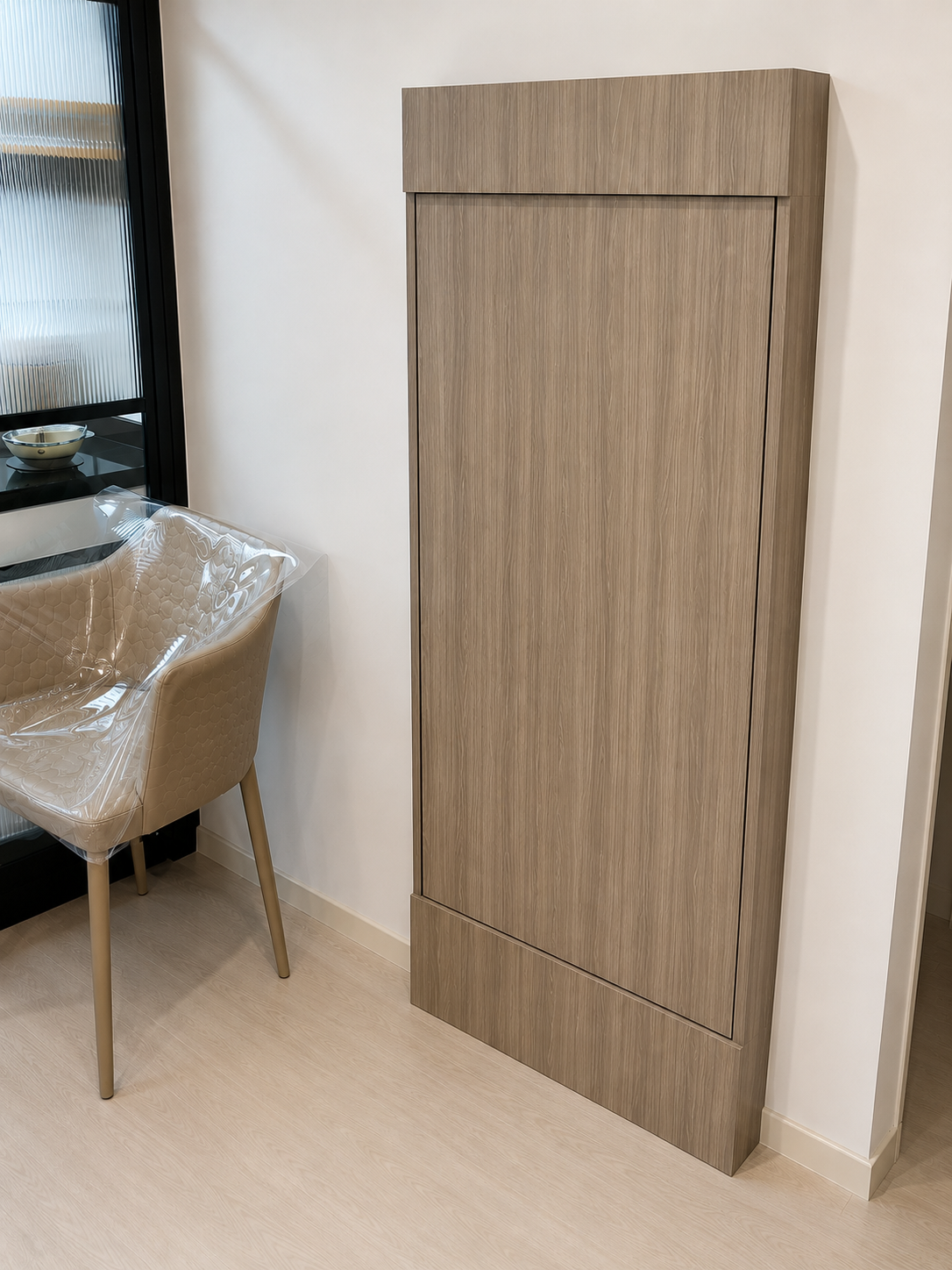 Display cabinet wall with bed folded away