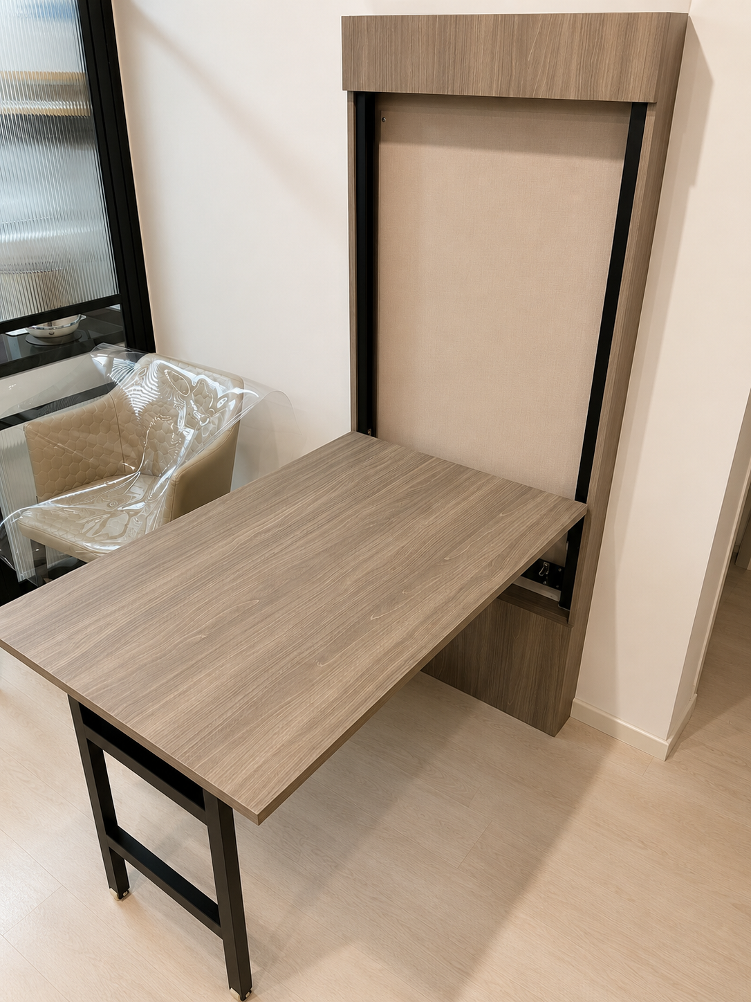 Fold-down dining table