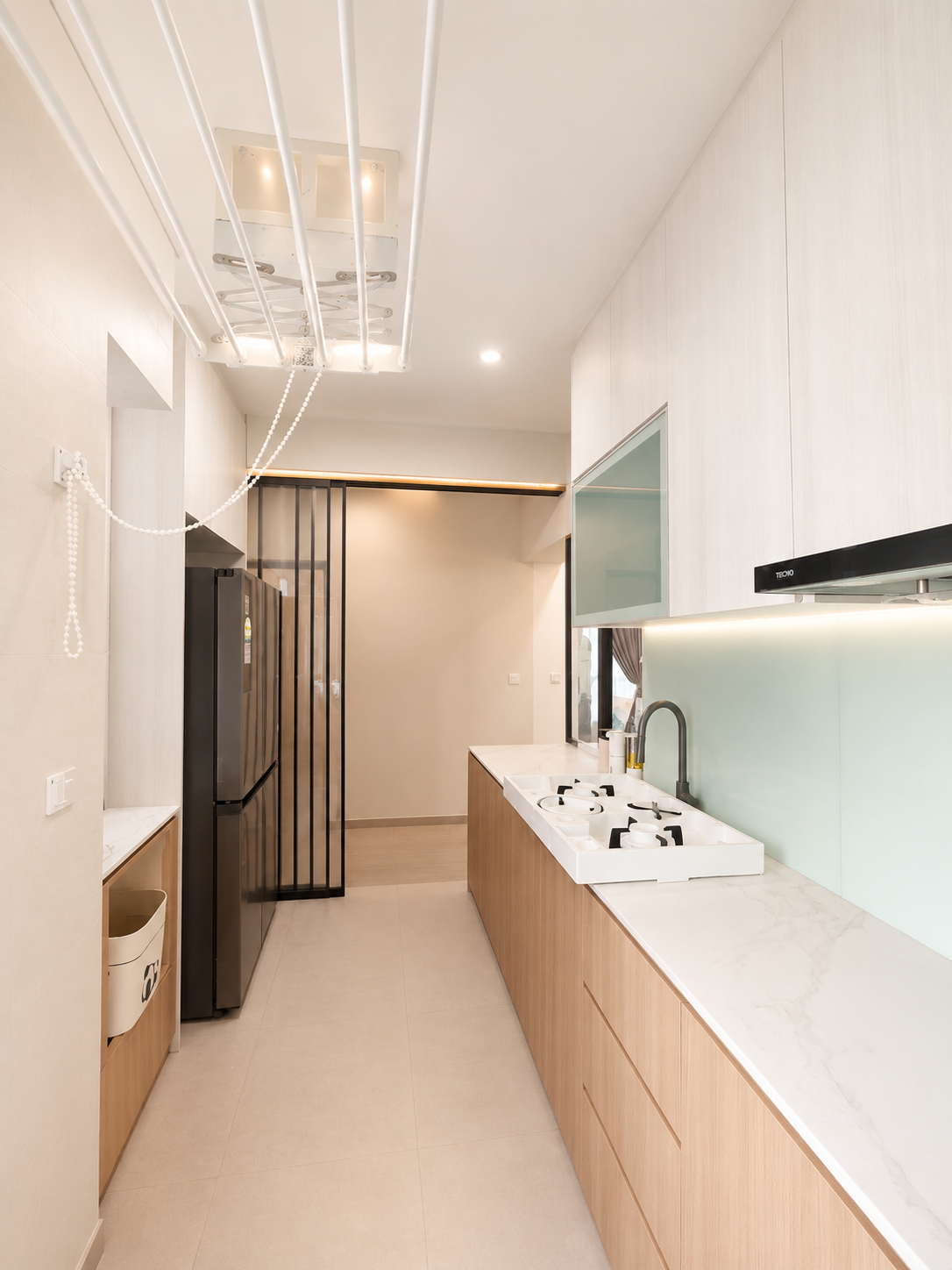 fitted hdb kitchen carpentry between walls in a tengah park bto flat