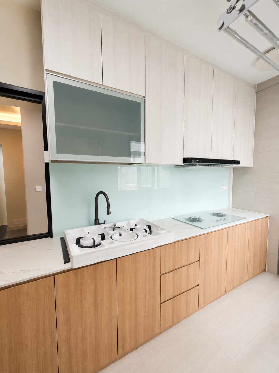 built-in hdb kitchen scribed between walls in a tengah park bto flat