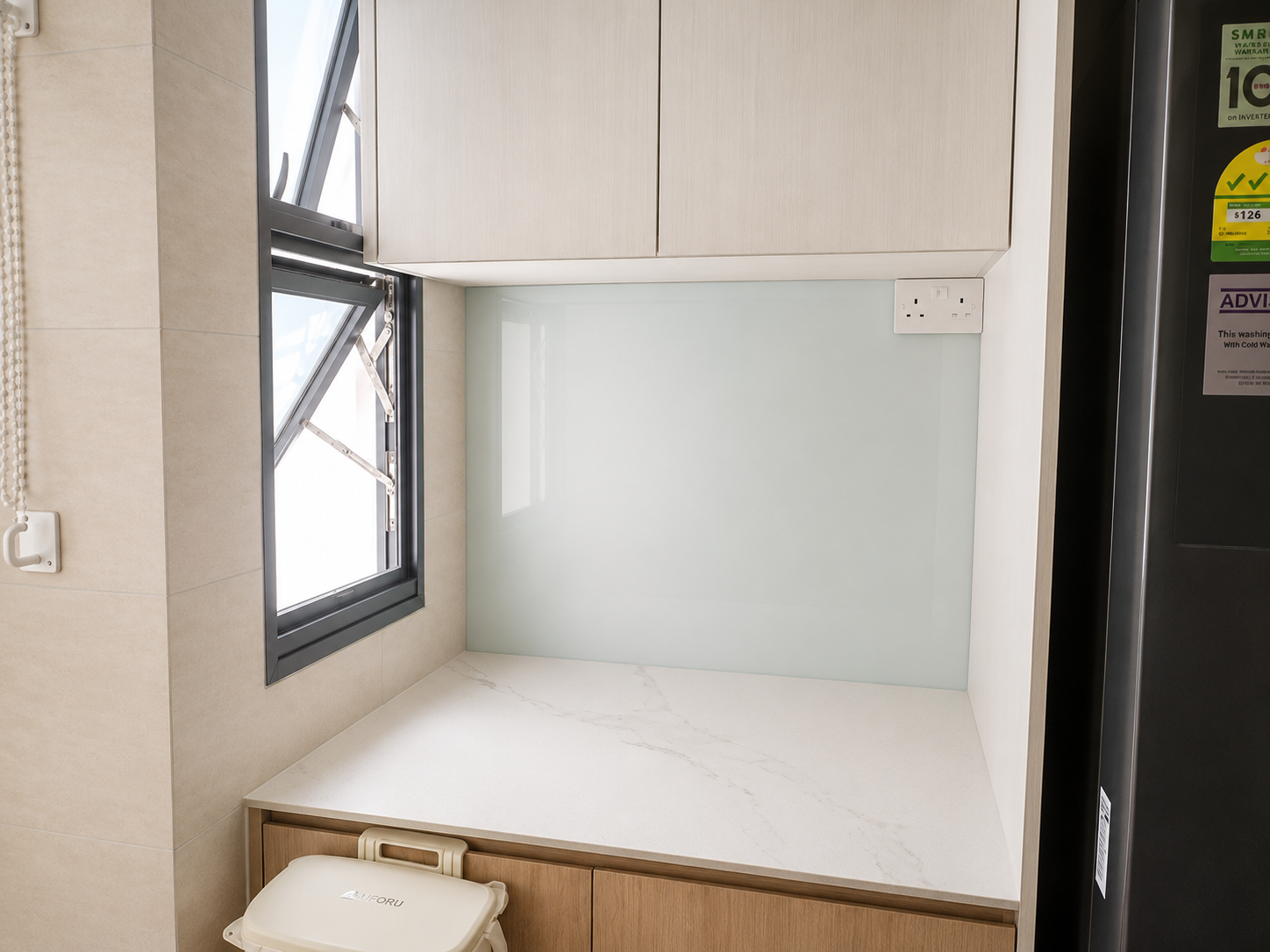 hdb service yard with tiled floor in a tengah park bto flat
